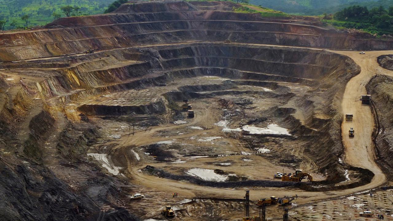 Excavators and drillers at work in an open pit at Tenke Fungurume, a copper and cobalt mine 110 km (68 miles) northwest of Lubumbashi in Congo's copper-producing south, January 29, 2013.