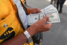 dolares, agencia andina