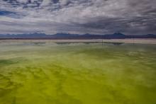 A brine pool reflects clouds at a lithium mine in the Atacama salt flat, close to San Pedro de Atacama area, Antofagasta region, Chile May 4, 2023. REUTERS/Ivan Alvarado