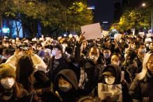 Para los jóvenes chinos, las protestas por medidas COVID son sínónimo de desafío y euforia